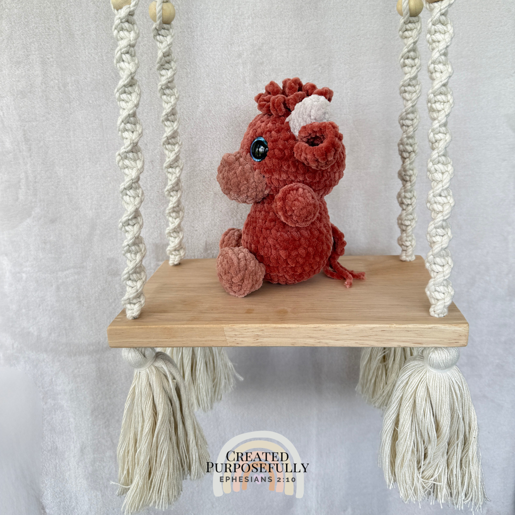 Handmade Highland cow crochet plush made with soft plush yarn and adorable handmade details