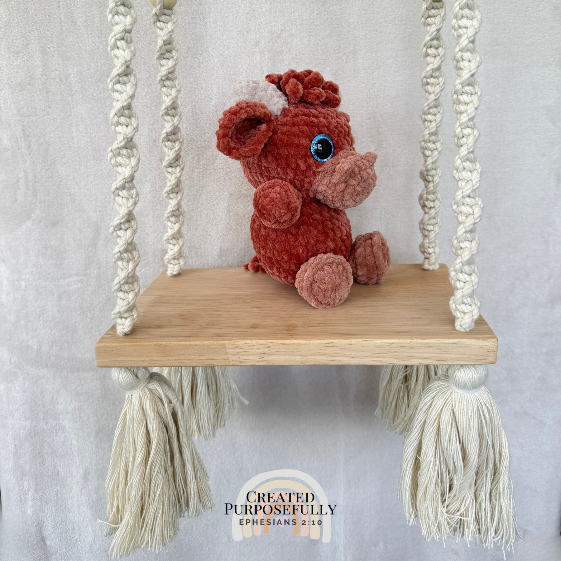 Handmade Highland cow crochet plush made with soft plush yarn and adorable handmade details