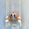 Handmade peach crochet sloth plush made with soft plush yarn and adorable handmade details