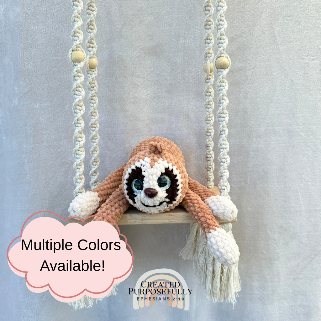 Handmade peach crochet sloth plush made with soft plush yarn and adorable handmade details