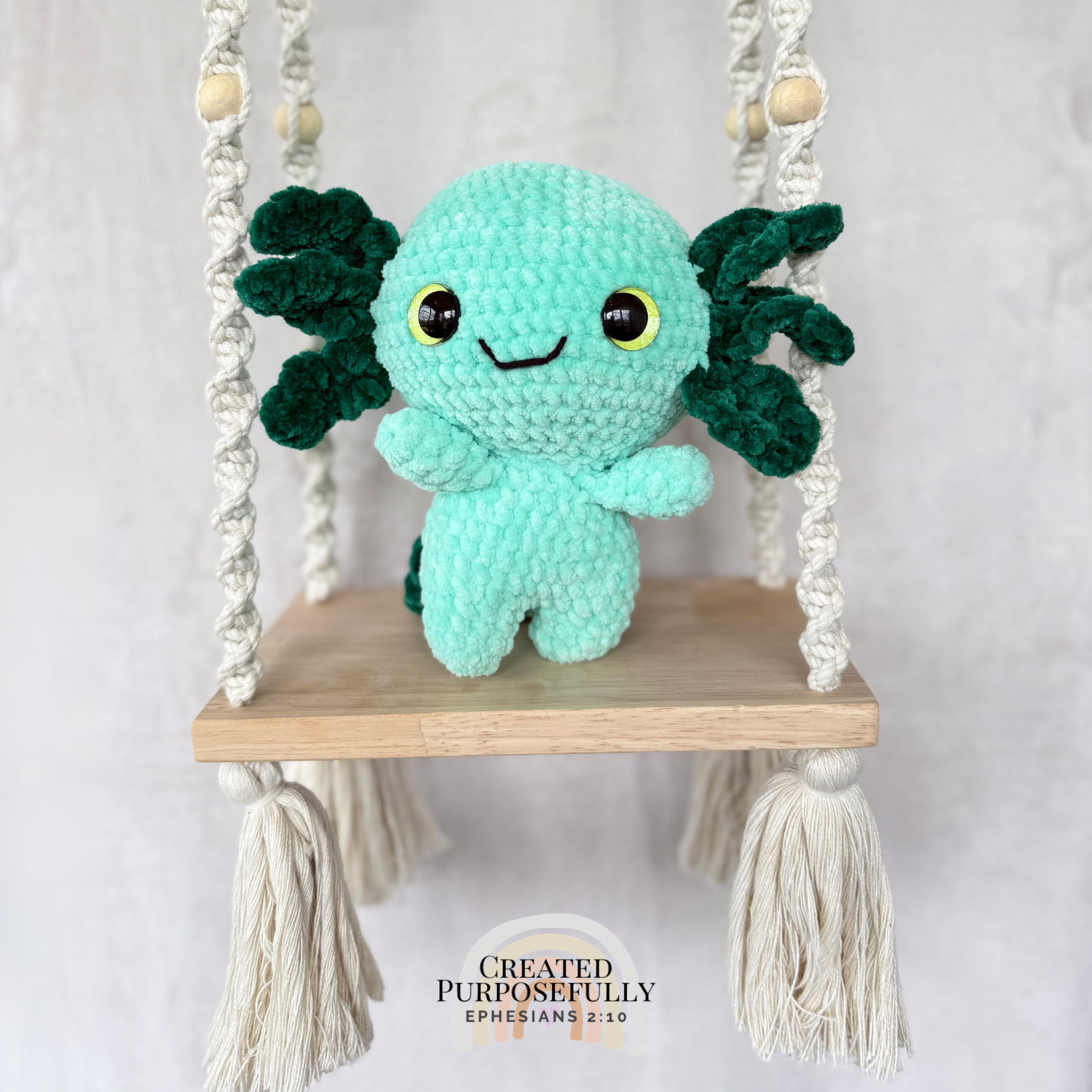 Handmade standing axolotl crochet plush made with soft plush yarn and adorable handmade details