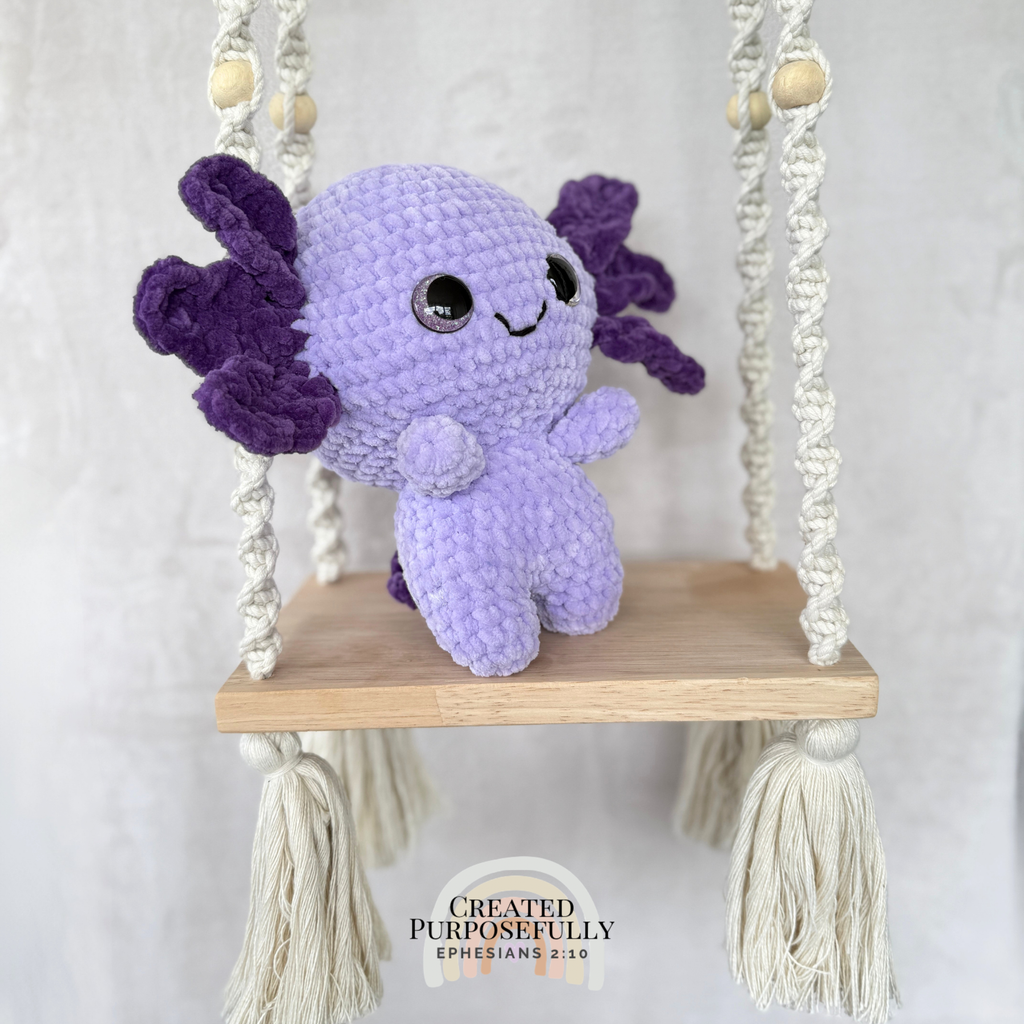 Handmade standing axolotl crochet plush made with soft plush yarn and adorable handmade details
