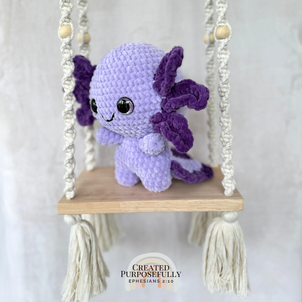 Handmade standing axolotl crochet plush made with soft plush yarn and adorable handmade details