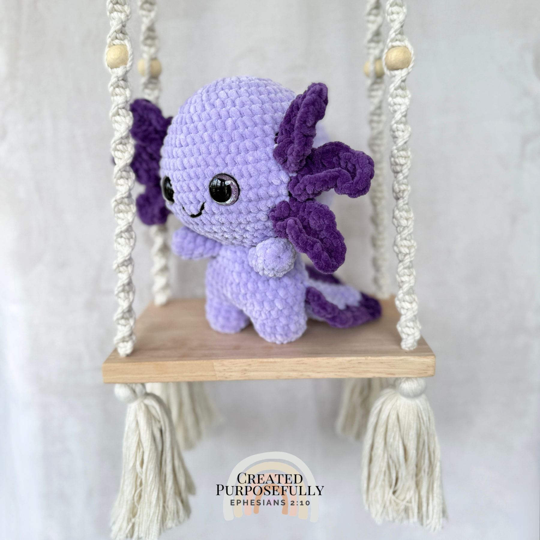 Handmade standing axolotl crochet plush made with soft plush yarn and adorable handmade details