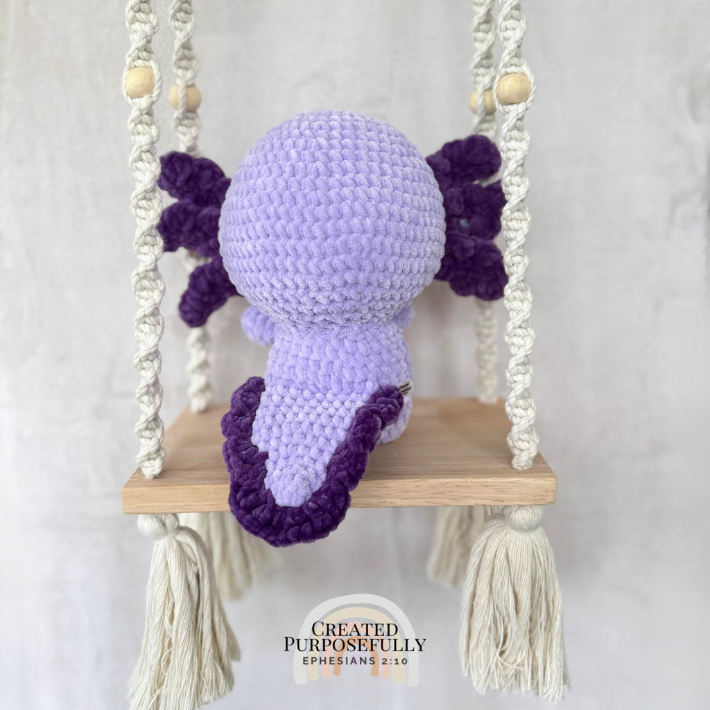 Handmade standing axolotl crochet plush made with soft plush yarn and adorable handmade details