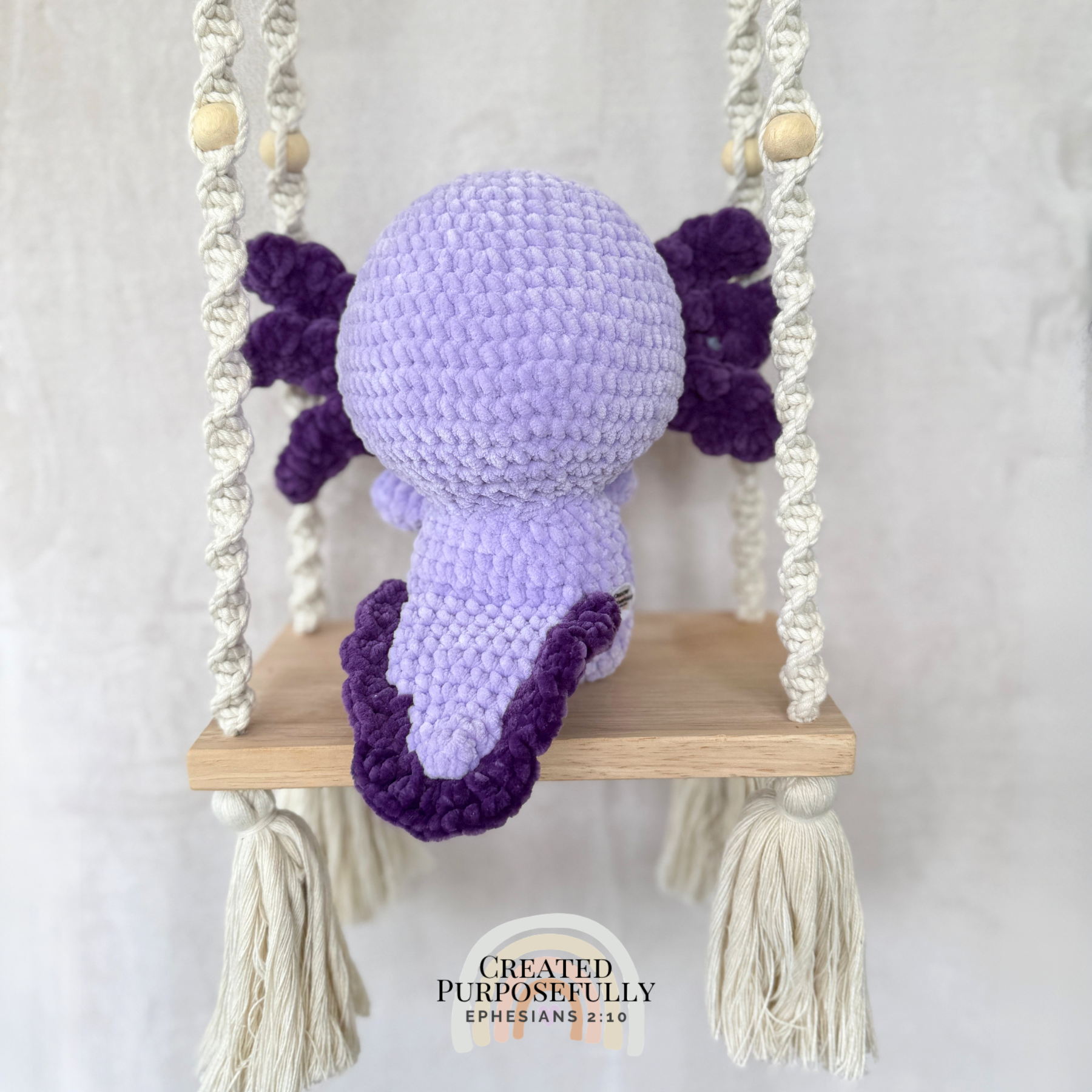 Handmade standing axolotl crochet plush made with soft plush yarn and adorable handmade details