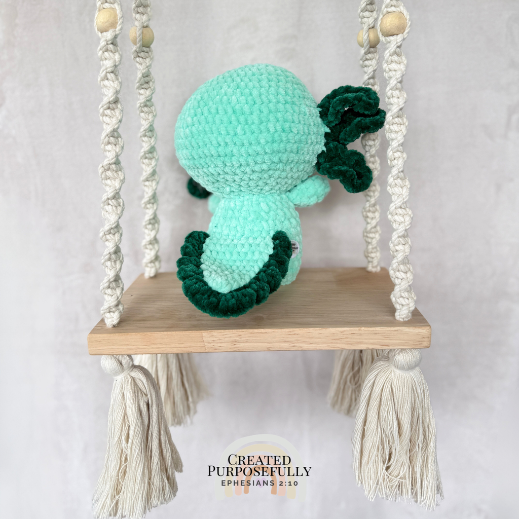 Handmade standing axolotl crochet plush made with soft plush yarn and adorable handmade details