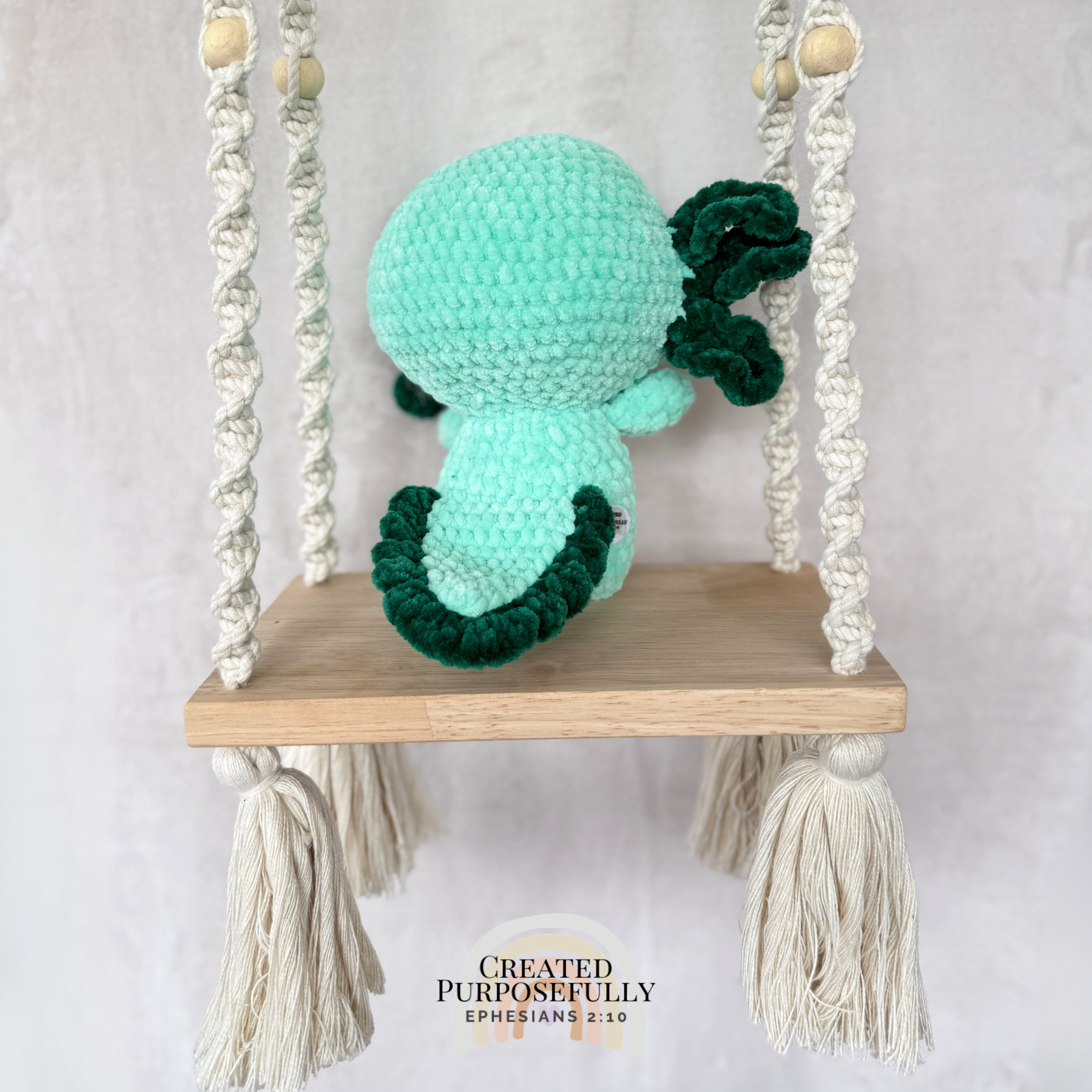Handmade standing axolotl crochet plush made with soft plush yarn and adorable handmade details