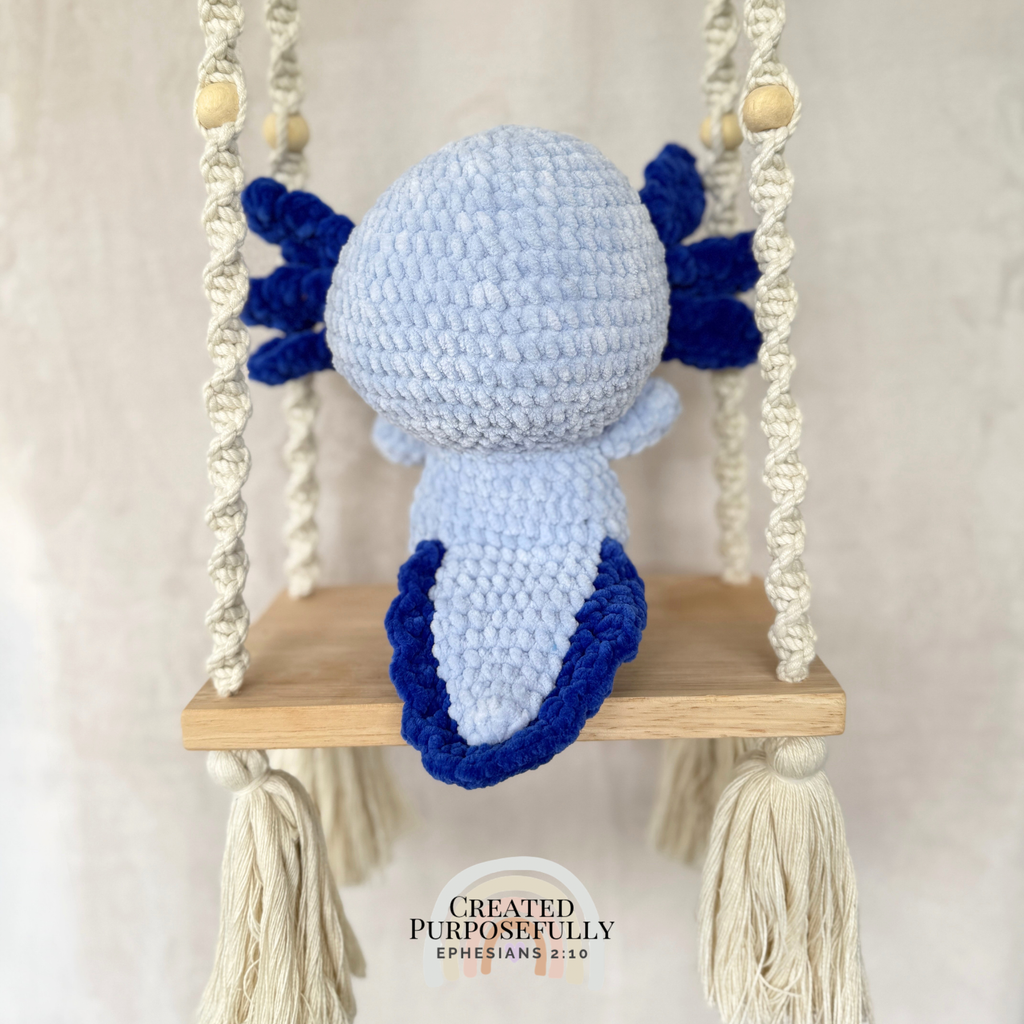 Handmade standing axolotl crochet plush made with soft plush yarn and adorable handmade details