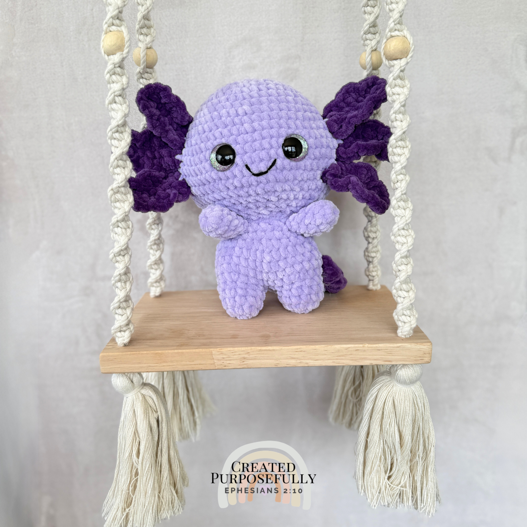 Handmade standing axolotl crochet plush made with soft plush yarn and adorable handmade details