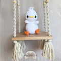 Handmade white crochet duck plush made with soft plush yarn and adorable handmade details