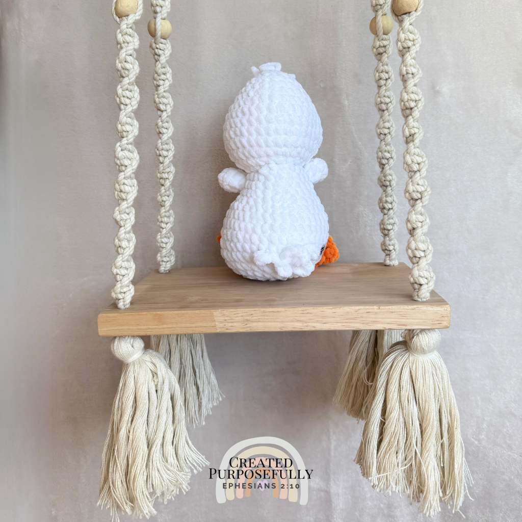 Handmade white crochet duck plush made with soft plush yarn and adorable handmade details