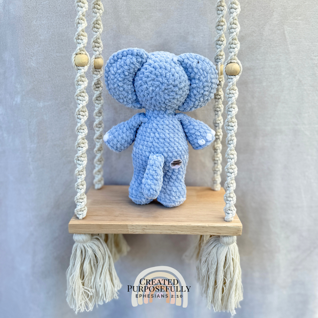 Handmade standing crochet elephant plush with floppy ears and a trunk made with soft yarn by Created Purposefully