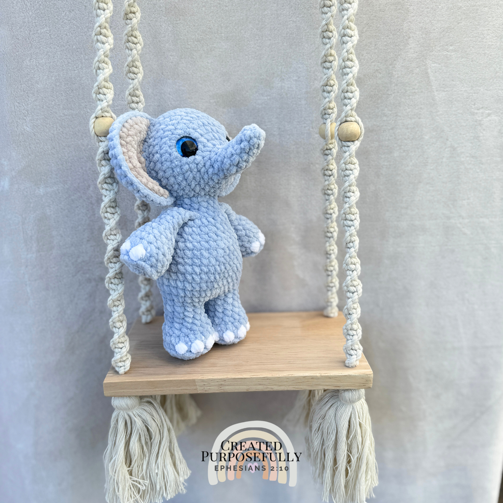 Handmade standing crochet elephant plush with floppy ears and a trunk made with soft yarn by Created Purposefully