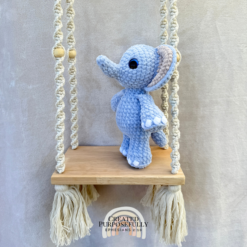 Handmade standing crochet elephant plush with floppy ears and a trunk made with soft yarn by Created Purposefully