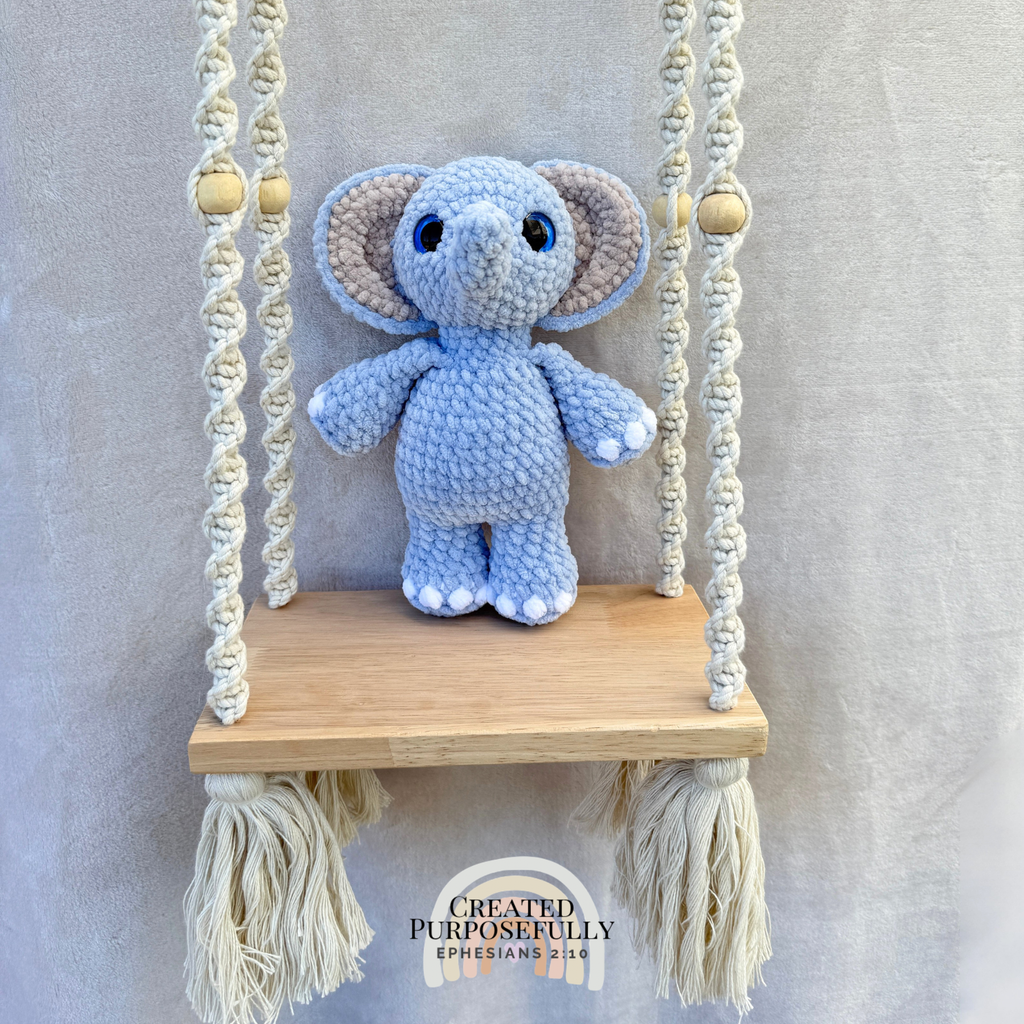 Handmade standing crochet elephant plush with floppy ears and a trunk made with soft yarn by Created Purposefully